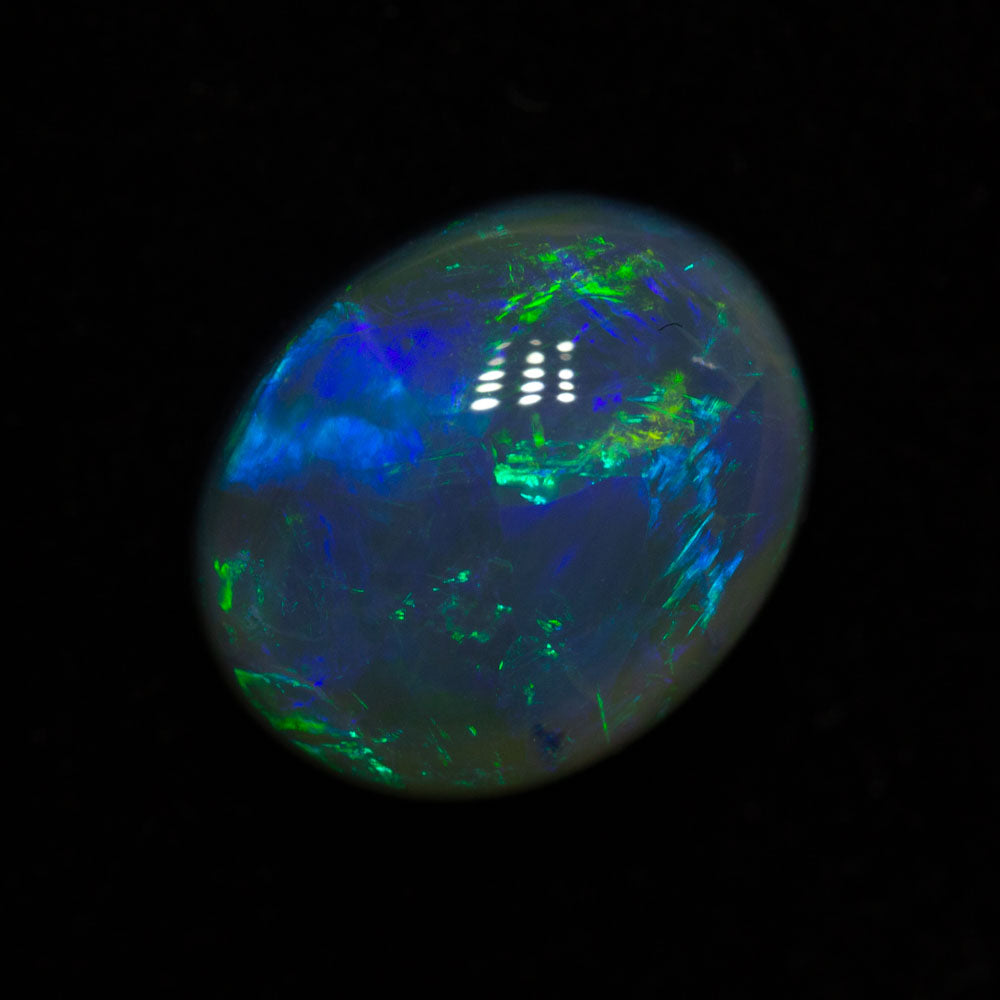 4.09 ct black opal 11.4x9.3x6mm