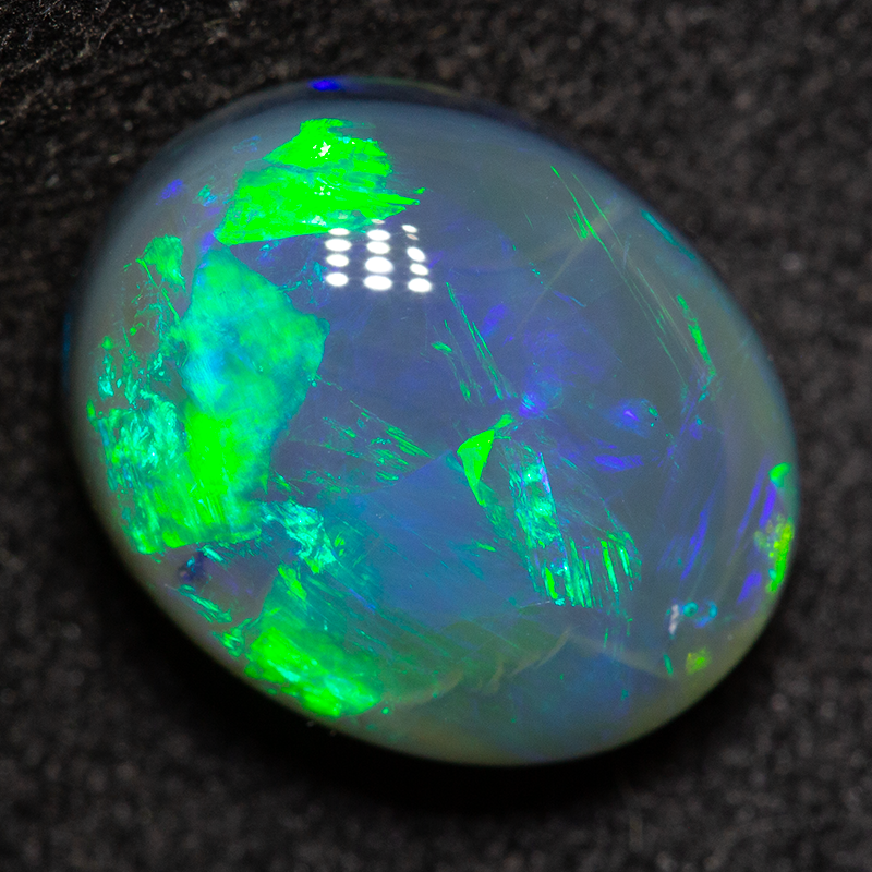 4.09 ct black opal 11.4x9.3x6mm