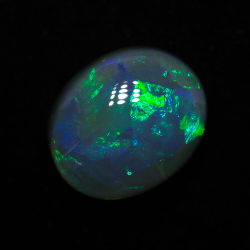 4.09 ct black opal 11.4x9.3x6mm