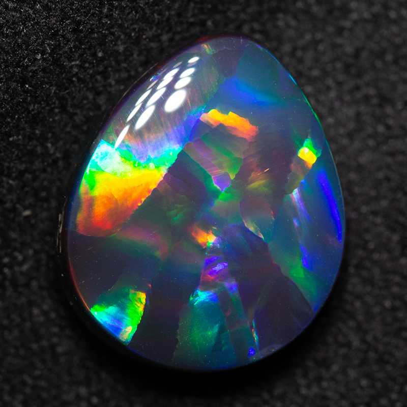 4.16 ct gem black opal 12.6x10.6x4.8mm