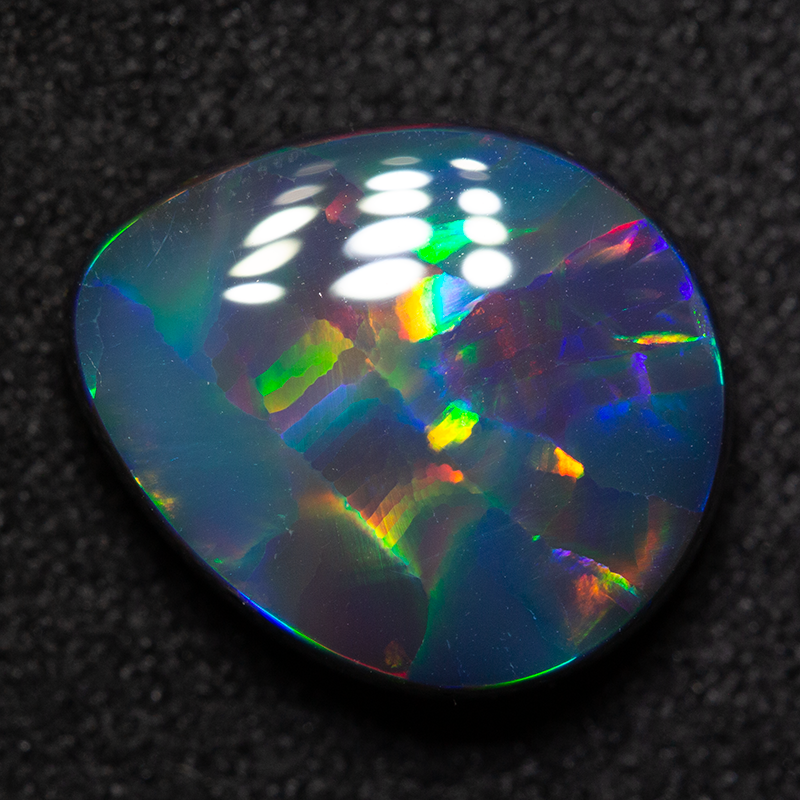 4.16 ct gem black opal 12.6x10.6x4.8mm