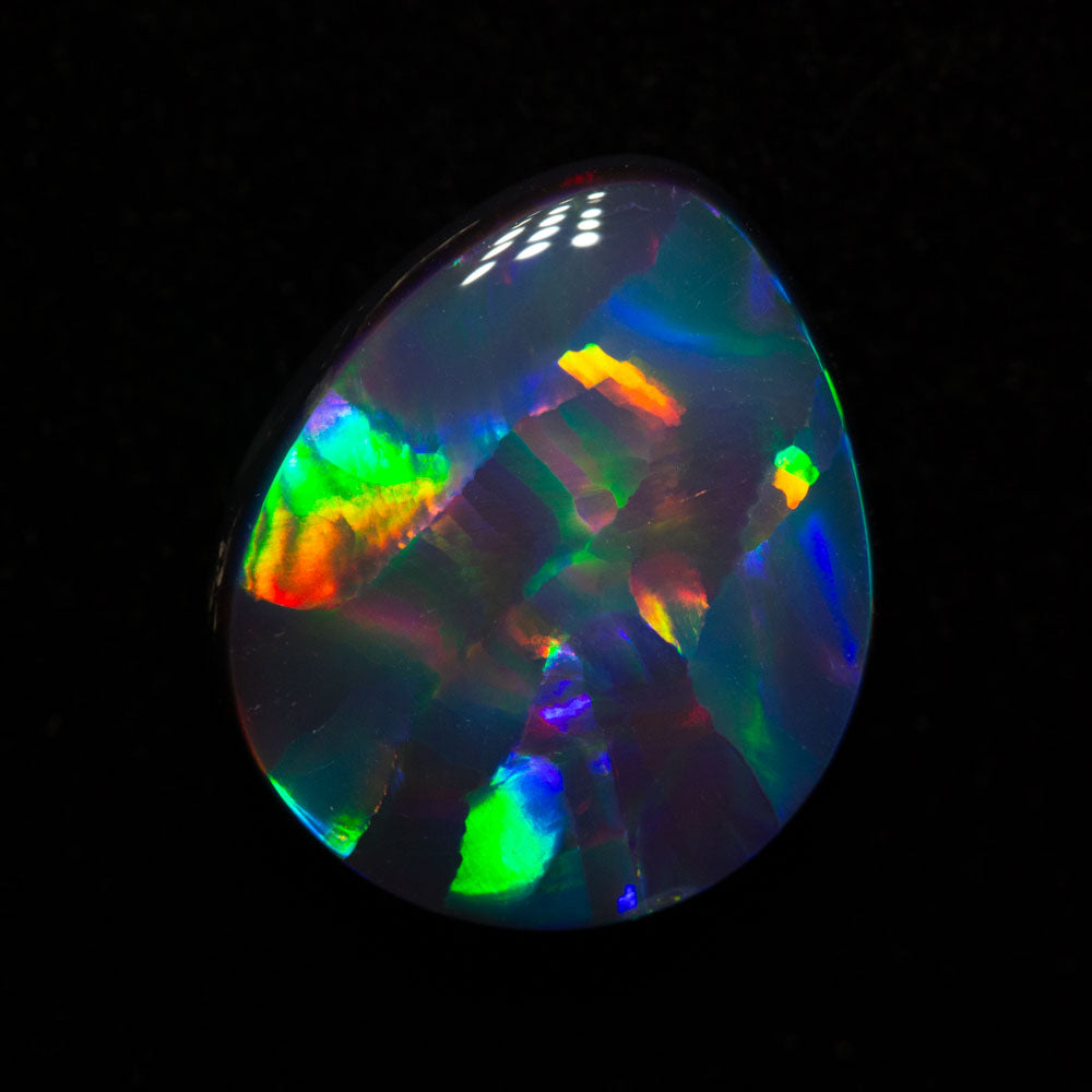 4.16 ct gem black opal 12.6x10.6x4.8mm