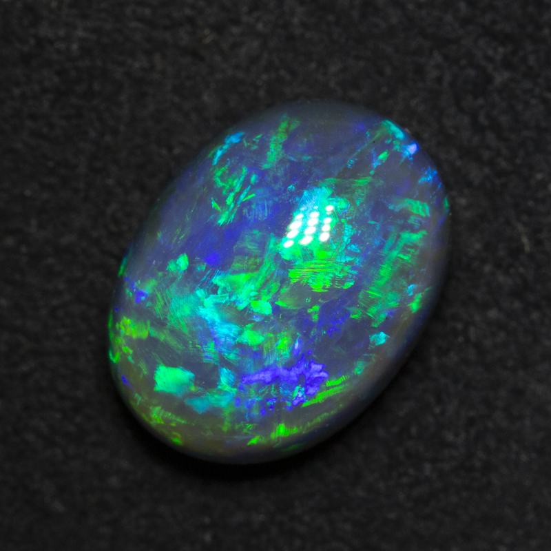 4.20 ct gem black opal 11.8x8.8x6.4mm