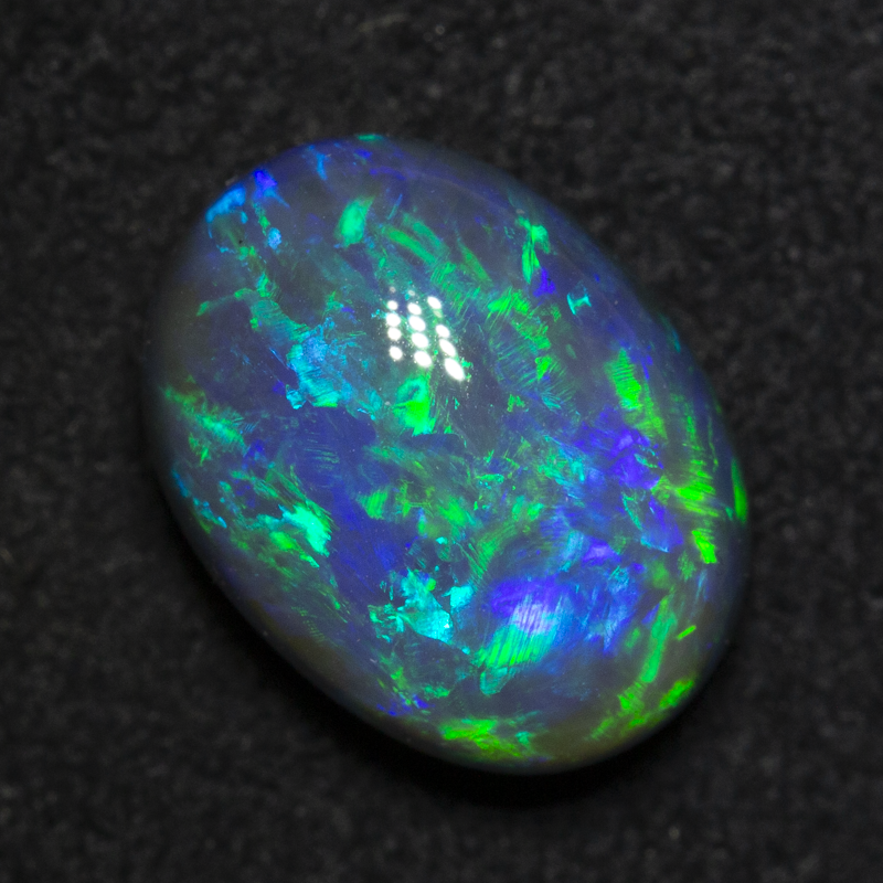 4.20 ct gem black opal 11.8x8.8x6.4mm