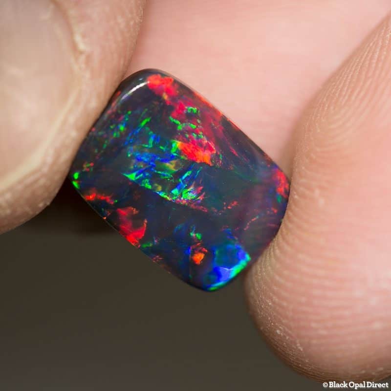 4.28 ct top gem cushion cut black opal collectors piece 13x9x4mm