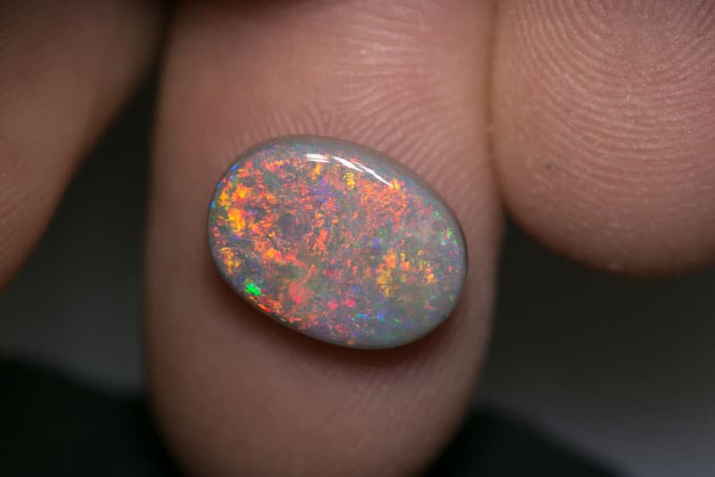 4.28 ct dark opal 13x10x4.5mm