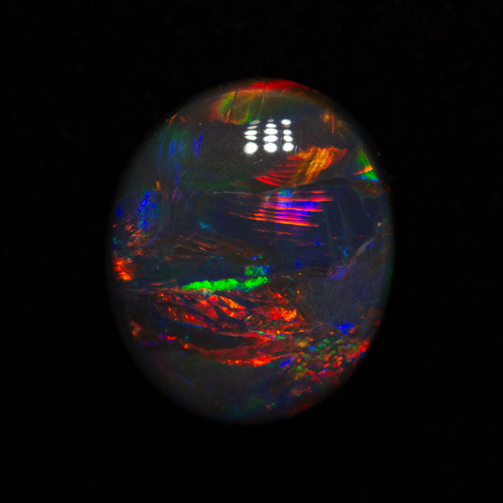 4.39 ct gem black opal 12x10x6mm