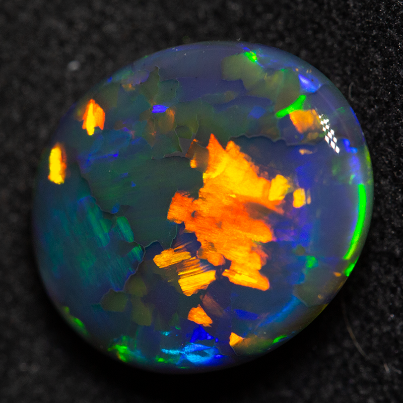 4.41 ct double sided gem black opal 12.2x10.4x5.7mm