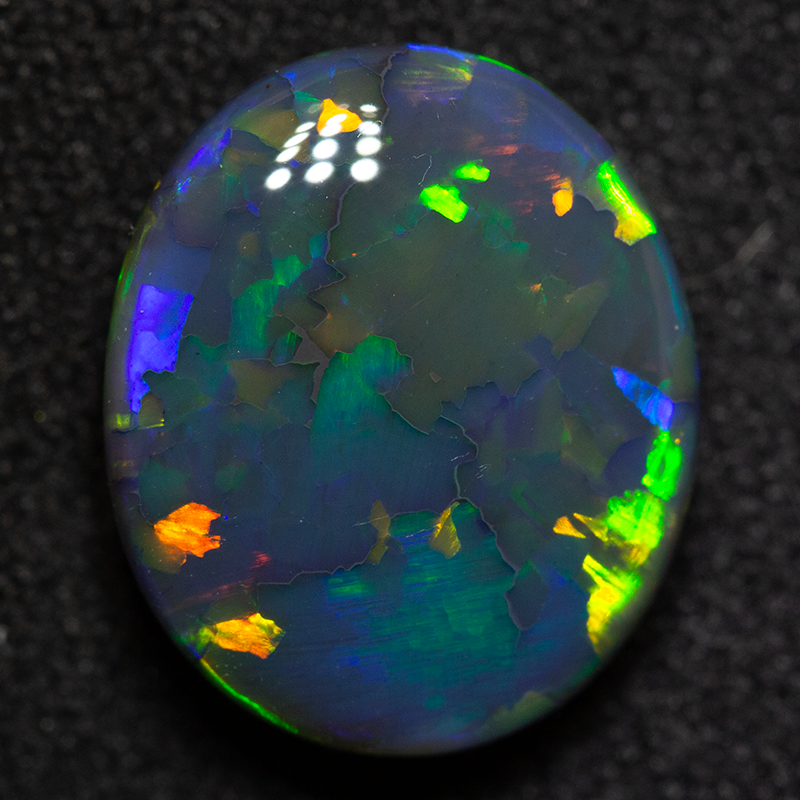 4.41 ct double sided gem black opal 12.2x10.4x5.7mm
