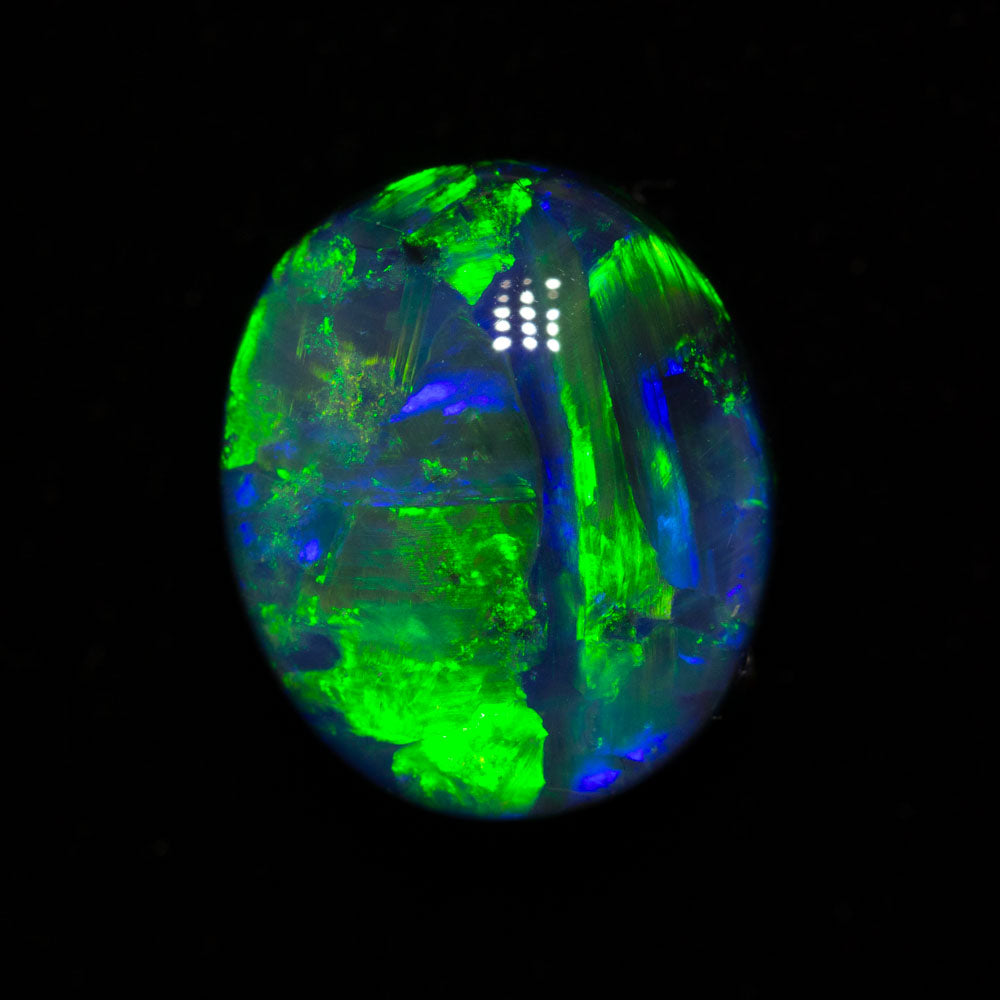 4.42 ct black opal 11.2x9.5x6.4mm