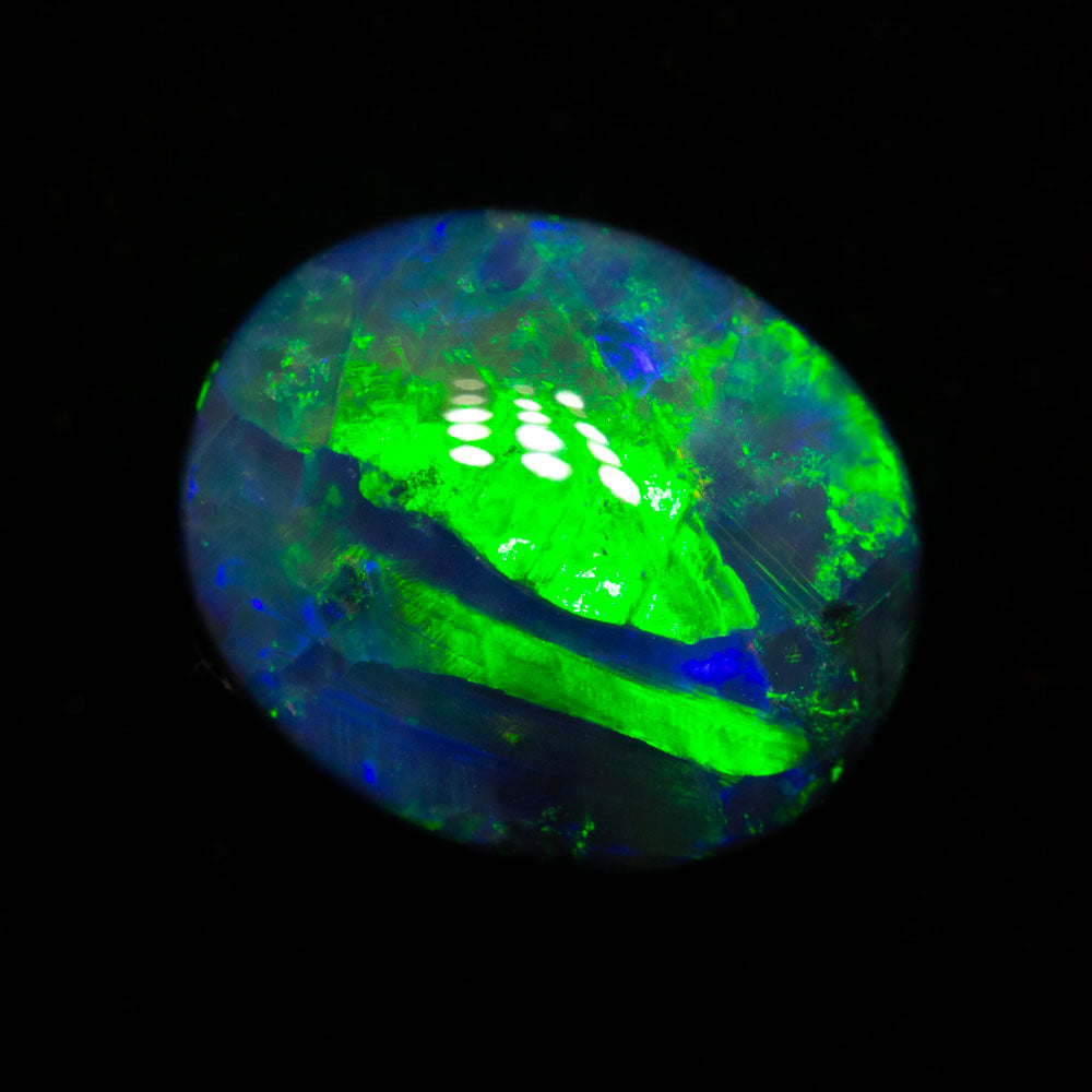 4.42 ct black opal 11.2x9.5x6.4mm