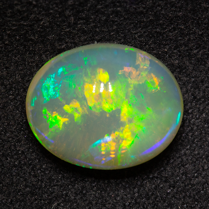 4.48 ct double-sided crystal opal 11.7x9.4x6.5mm