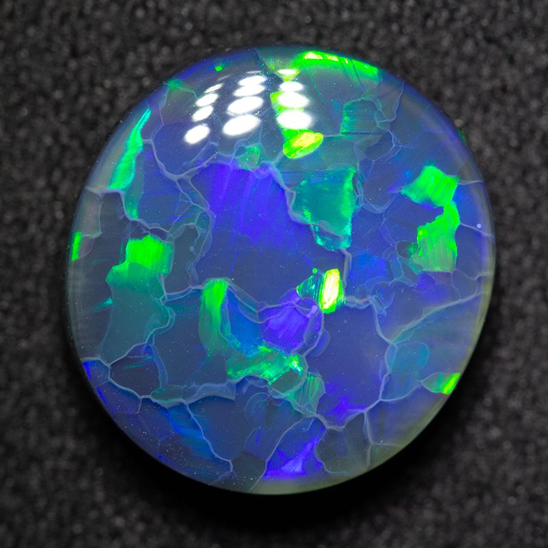 4.66 ct black opal 12.4x11.6x5mm