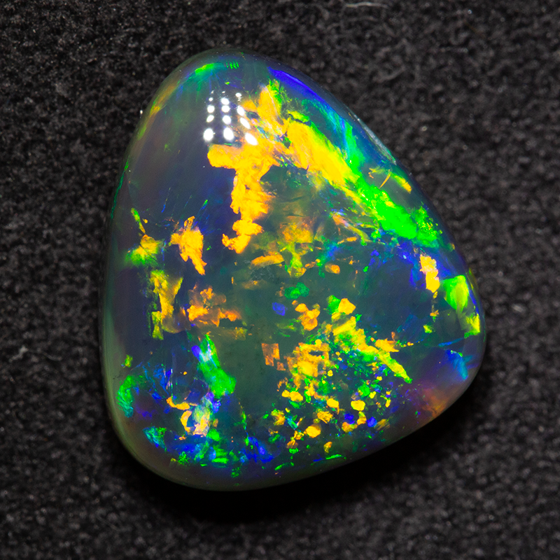 4.68 ct gem black opal 12.3x11x5.6mm