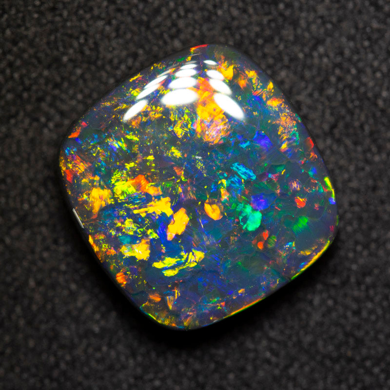 4.75 ct gem black opal 11.8x11.3x4.7mm