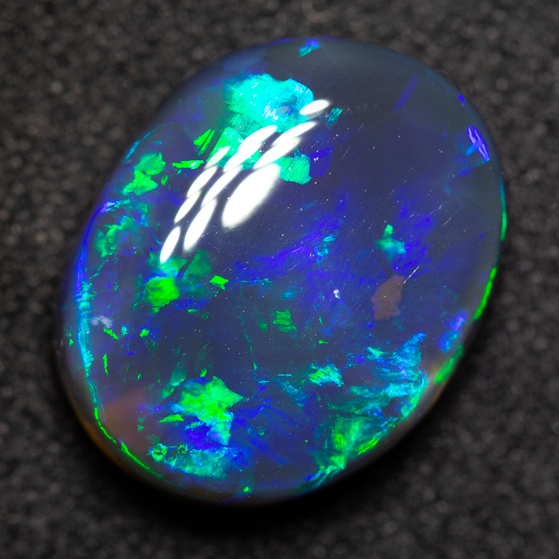 4.77 ct black opal 13x10.4x5.2mm
