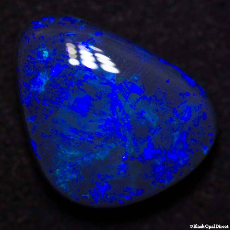 4.77 ct baroque black opal 14x12x5mm