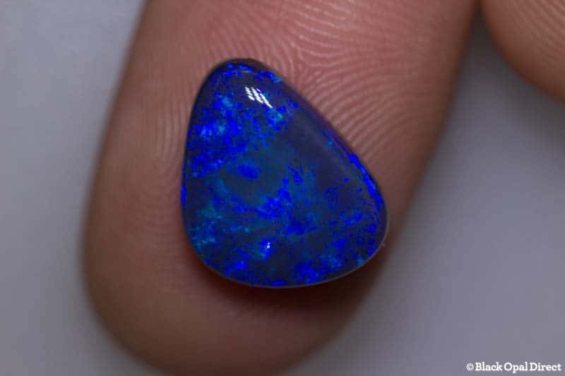 4.77 ct baroque black opal 14x12x5mm