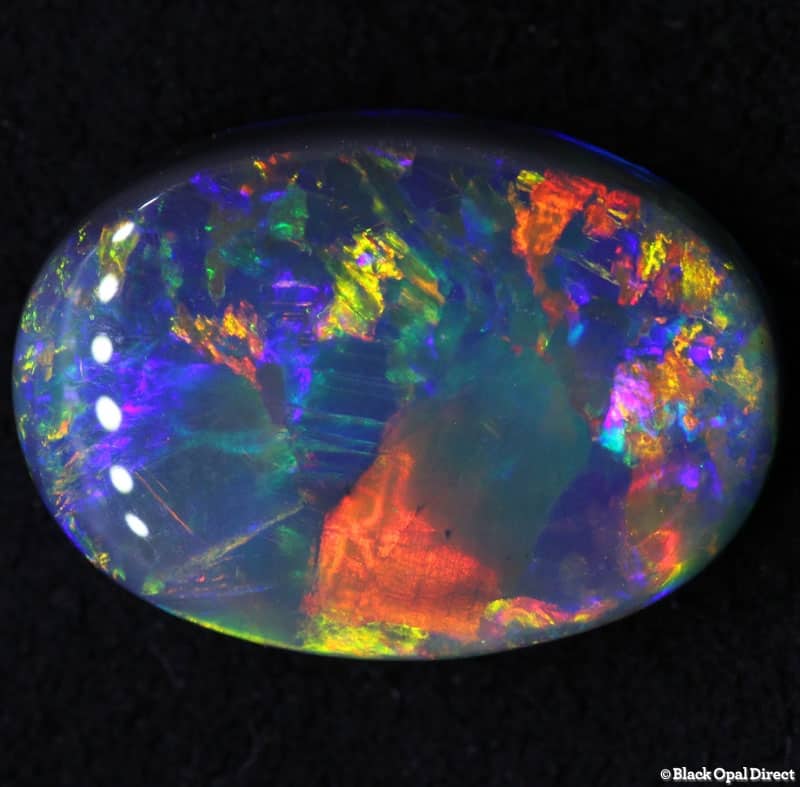4.88ct black opal gem