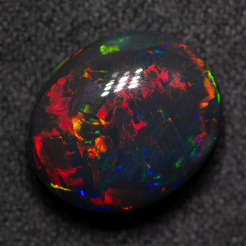 4.91 ct gem black opal 12x10x6.5mm
