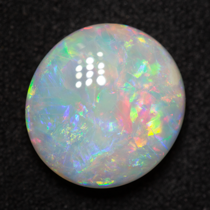 4.91 ct white opal 12.5x11.5x5 mm