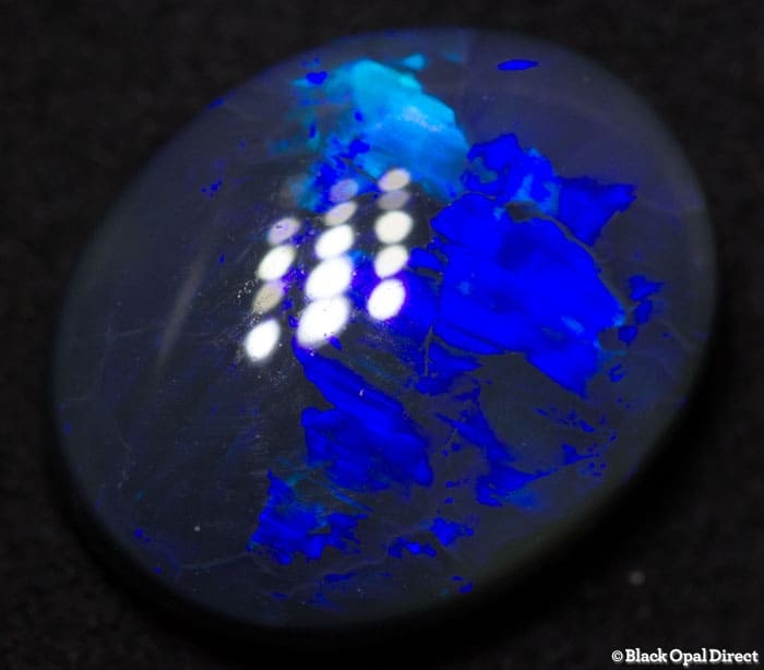 4.91 ct black opal gem 13.5x11x5mm