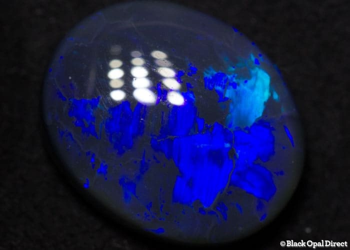 4.91 ct black opal gem 13.5x11x5mm