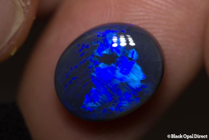 4.91 ct black opal gem 13.5x11x5mm