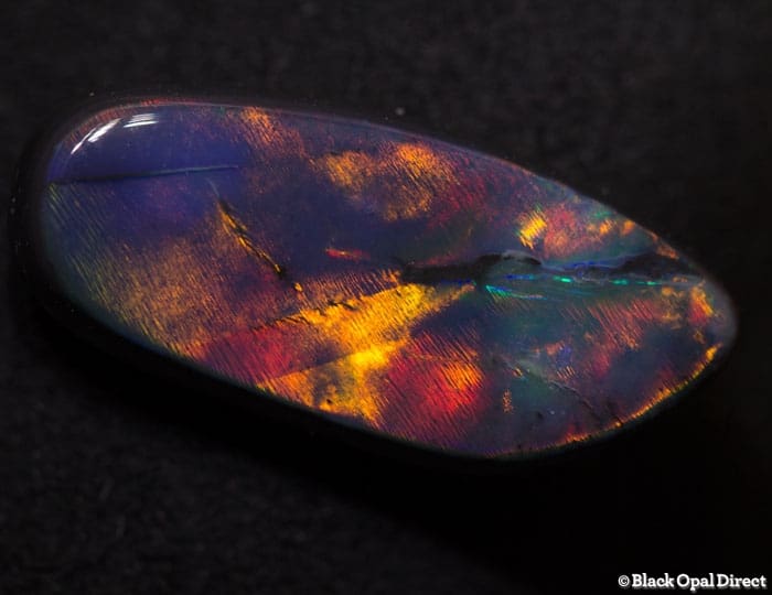 5.02 ct baroque gem black opal 18.5x8.5x4mm