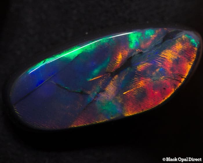 5.02 ct baroque gem black opal 18.5x8.5x4mm