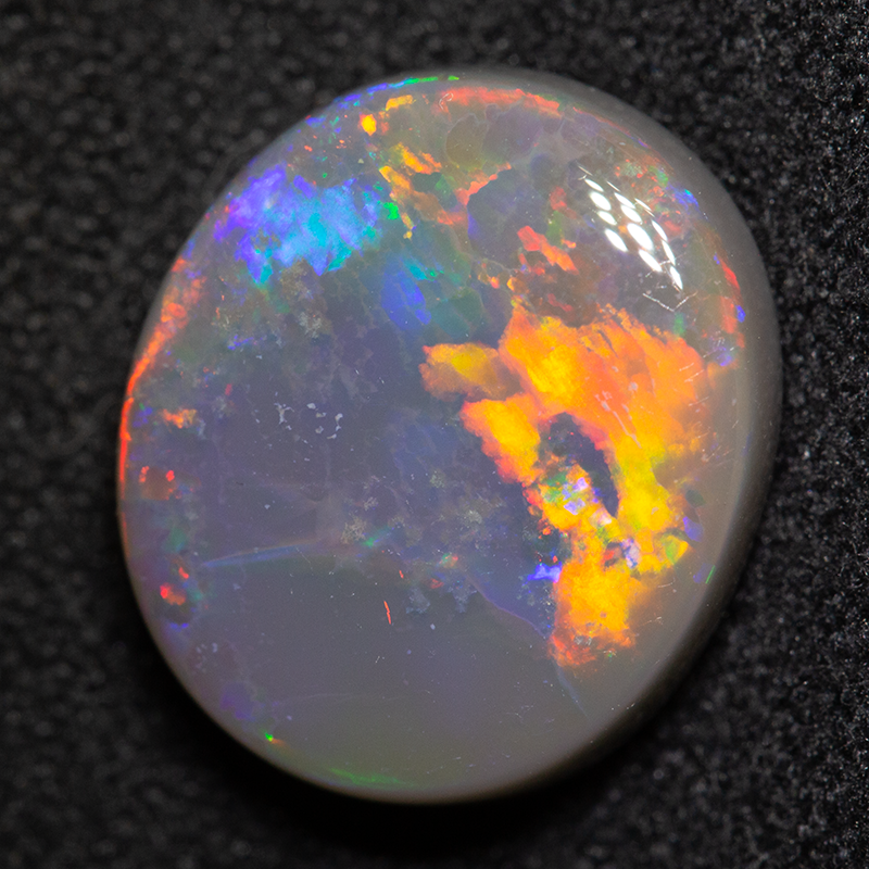 5.04 ct dark opal 13.2x11.4x5mm