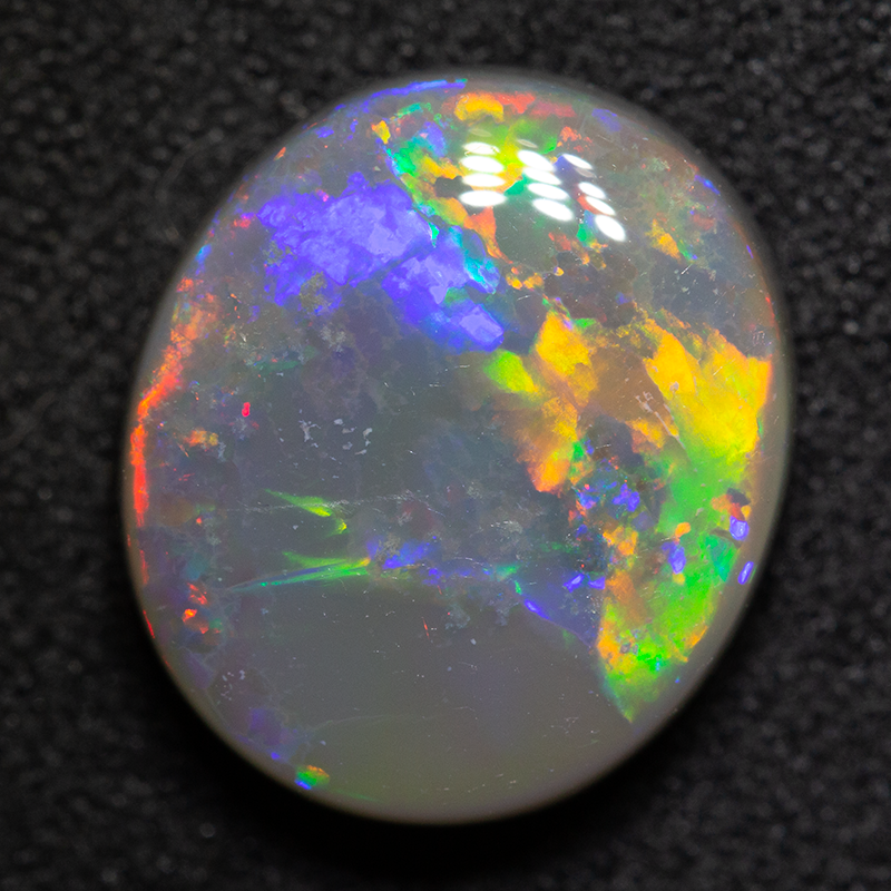 5.04 ct dark opal 13.2x11.4x5mm