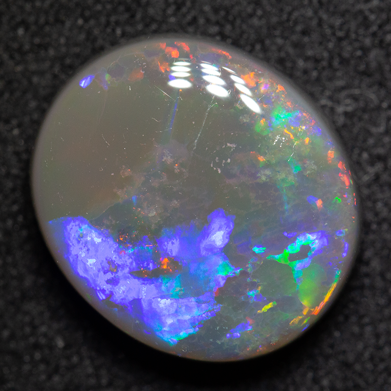 5.04 ct dark opal 13.2x11.4x5mm