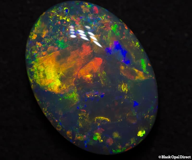 5.06 ct semi black gem opal 14.5x11x5mm