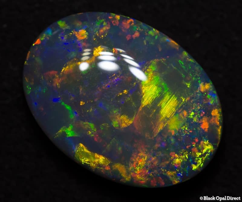 5.06 ct semi black gem opal 14.5x11x5mm