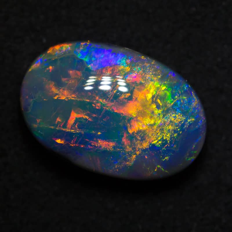 5.08 ct gem black opal 14x9.5x5.9mm