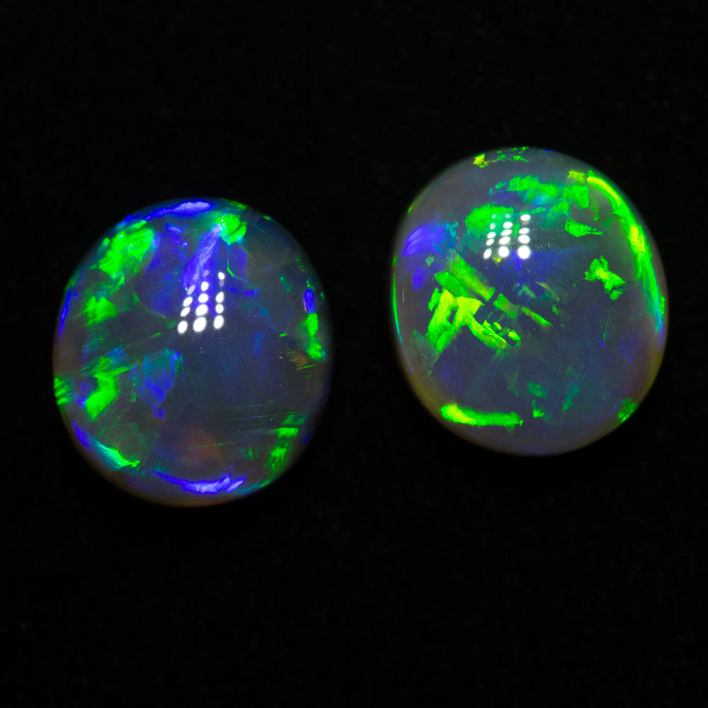 5.14 ct gem black opal pair 9.4x8.5x5.1mm