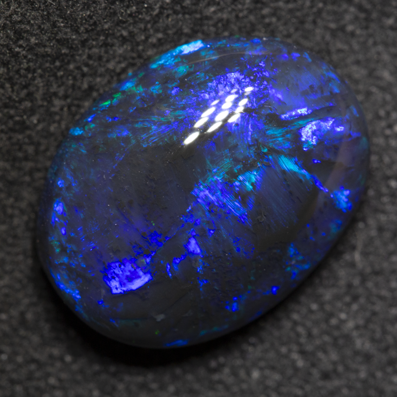5.24 ct black opal 13.7x10.7x6.2mm