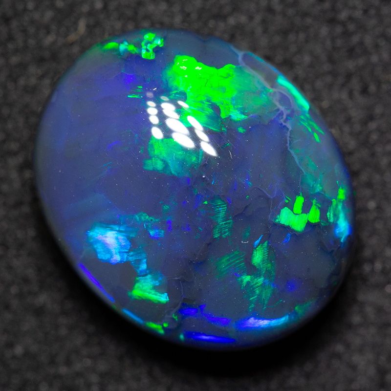 5.29 ct black opal 12.7x10.6x6.1mm
