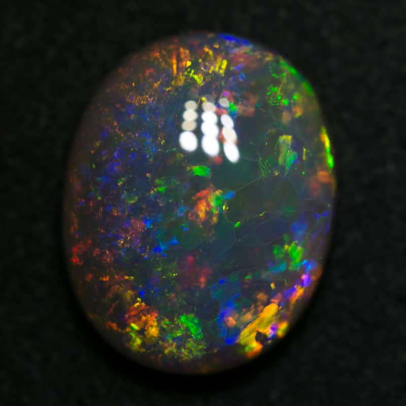 5.38 ct gem dark crystal opal 14x11x5mm