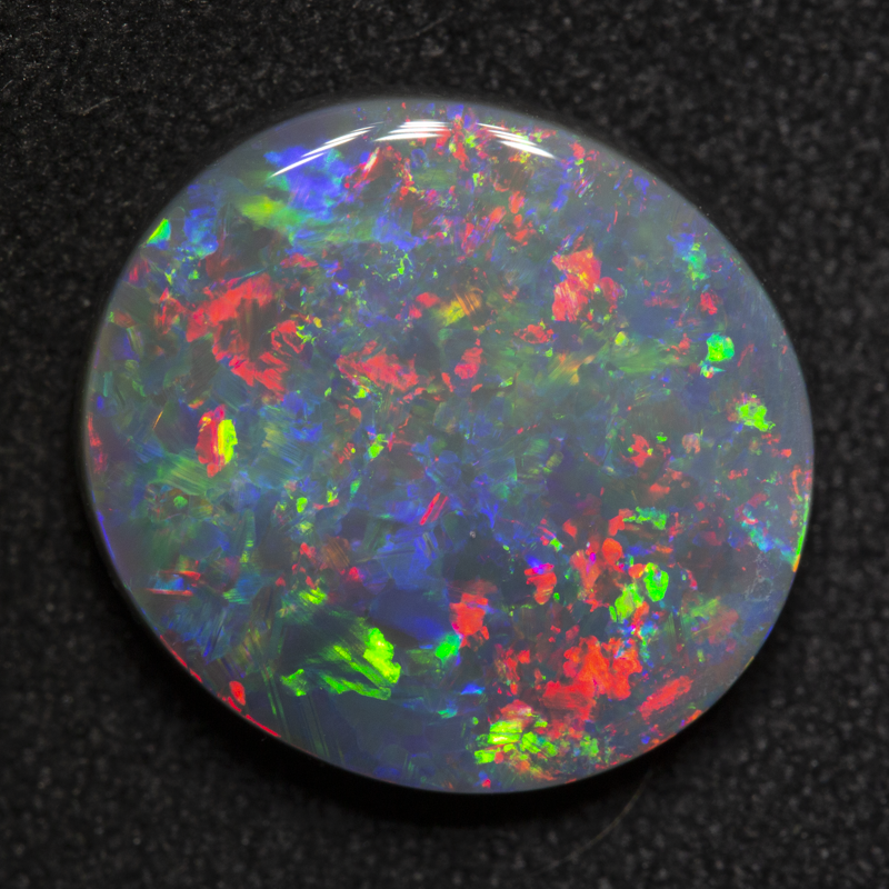 5.48 ct dark opal 14.3x13.2x4.2mm