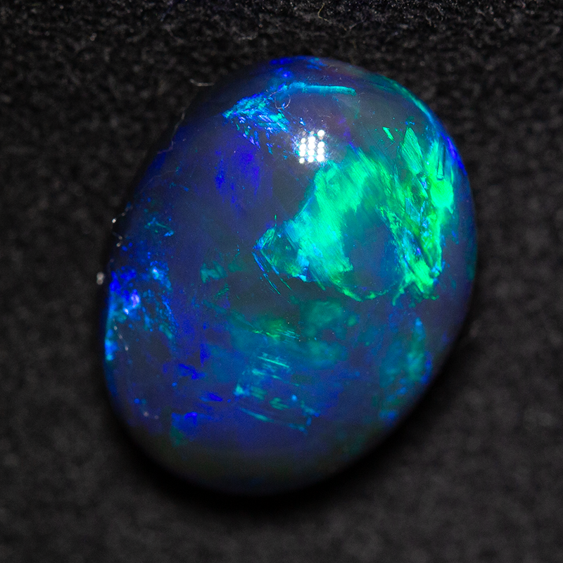 5.61 ct black opal 13.3x10.2x6.8mm