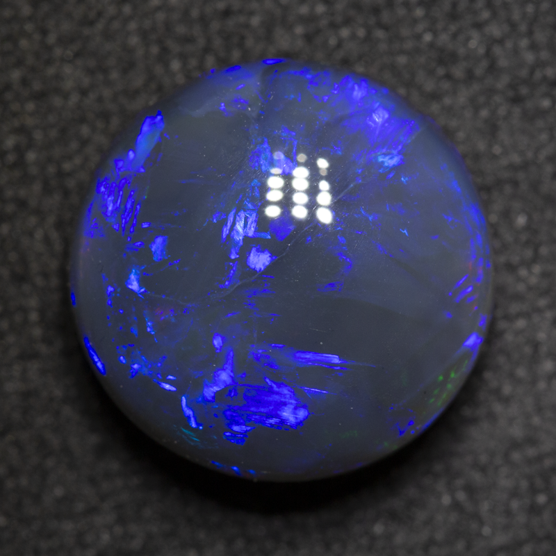 5.66 ct black opal 12.2x12x6.3mm