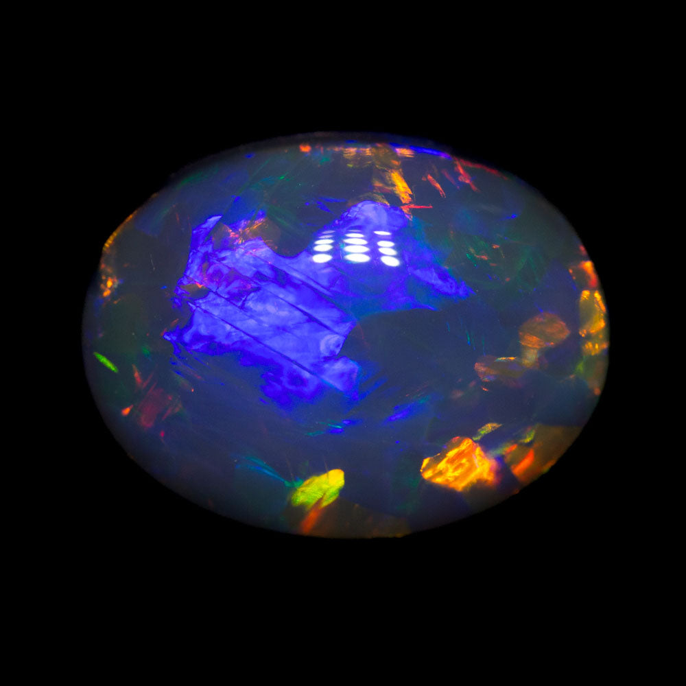 5.66 ct gem double-sided black opal 13.4x10.1x6.4mm