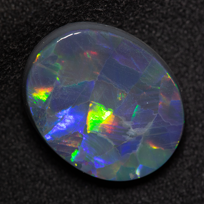 5.67 ct black opal 16x13x4 mm