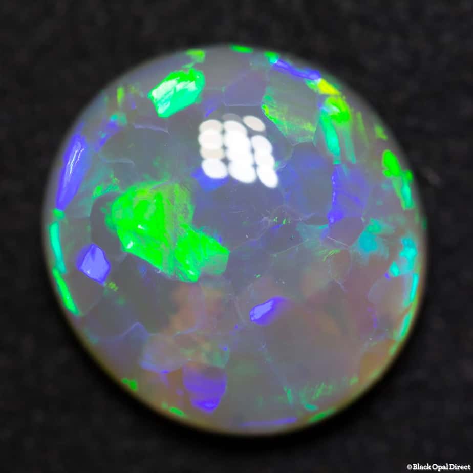 5.69 ct semi black opal 13.5x12.5x5mm