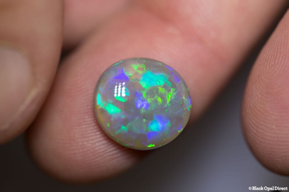 5.69 ct semi black opal 13.5x12.5x5mm
