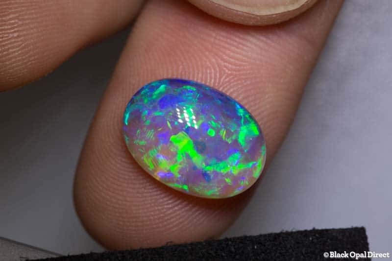 5.86 ct semi black crystal opal 15x11x5.5
