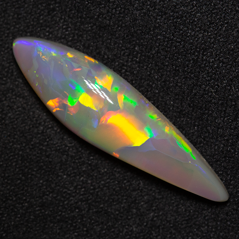 5.87 ct dark opal 27x7.5x5.4mm
