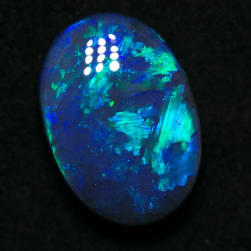 5.93 ct black opal 15x11x5.5mm